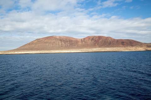 Agujas Grandes volcano, La Isla Graciosa from El Rio channel, Lanzarote, Canary Islands, Spain,