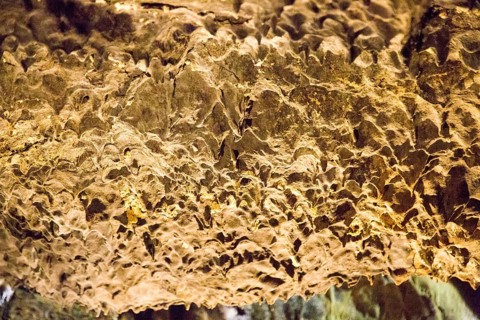 Lava stalactites on cave roof, Cueva de Los Verdes, cave tourist attraction in lava pipe tunnel,
