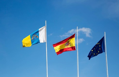Flags of the European Union, Spain and Canary Islands flying at the airport, Lanzarote, Canary
