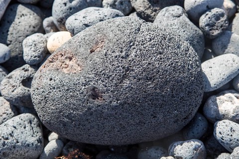 Large pumice stone rounded beach pebbles, Caleta de Caballo, Lanzarote, Canary islands, Spain,