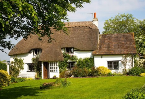 Pretty historic thatched cottage and garden, Cherhill, Wiltshire, England, UK