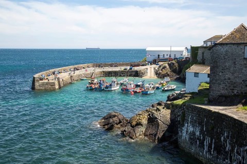 Fishing boats in the harbour at Coverack, Lizard Peninsula, Cornwall, England, UK