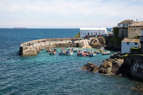 Fishing boats in the harbour at Coverack, Lizard Peninsula, Cornwall, England, UK
