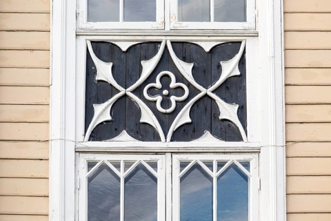Detail of wood windows, historic wooden cathedral church in city centre, Tromso, Norway, Europe