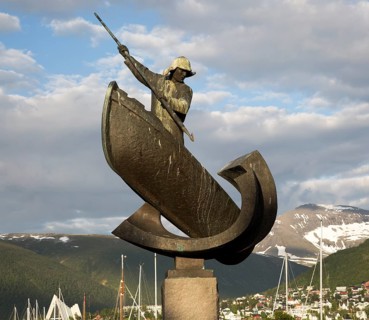 Whaling harpooning sculpture in harbour at Tromso, Norway, Europe