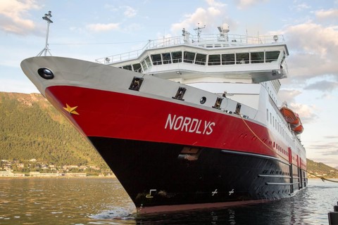 Hurtigruten ferry ship Nordlys approaching Tromso, Norway, Europe
