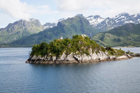 Small island, a roche moutonnee glacial landform, southern coast of Hinnoya Island, Nordland,