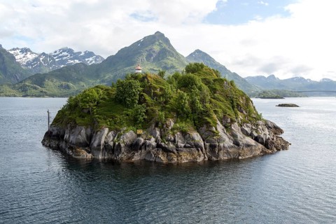 Small island, a roche moutonnee glacial landform, southern coast of Hinnoya Island, Nordland,