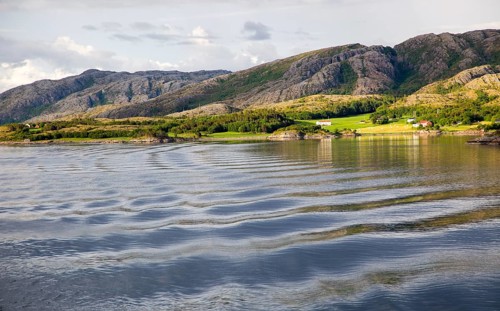 Rural coastal farming landscape near Rorvik, Norway, Europe