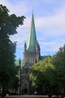 Early morning sunshine on historic cathedral spire, Nidaros Domkirke, Trondheim, Norway, Europe