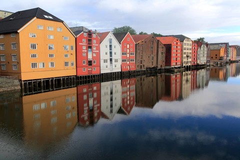 Historic waterside warehouse buildings on River Nidelva, Bryggene, Trondheim, Norway, Europe
