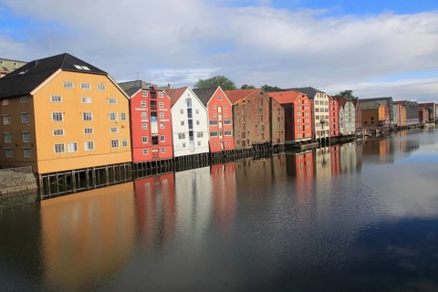 Historic waterside warehouse buildings on River Nidelva, Bryggene, Trondheim, Norway, Europe