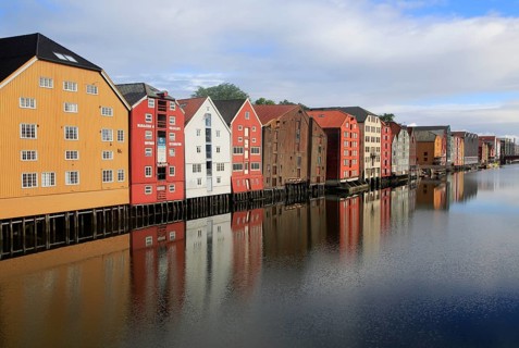 Historic waterside warehouse buildings on River Nidelva, Bryggene, Trondheim, Norway, Europe