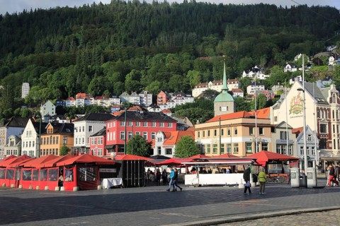 Historic buildings in the Torget fish market square area of Vagen harbour, Bergen, Norway, Europe