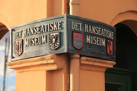 Close up of sign for the Hanseatic museum Bryggen area, city of Bergen, Norway UNESCO World