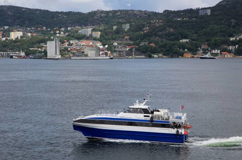 Fast small water taxi ferry boat service in city of Bergen, Norway, Europe