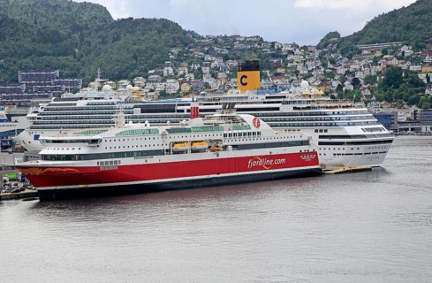 Fjordline ferry ship and cruise ship in docks, city of Bergen, Norway, Europe
