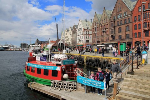 Waterside buildings and boats city centre, Vagen harbour, Bryggen area, Bergen, Norway, Europe