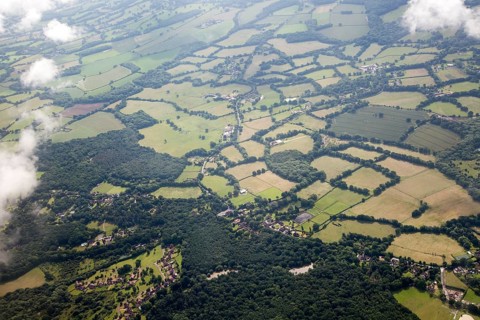 A patchwork of fields seen from the air near Gatwick airport, London, England, UK