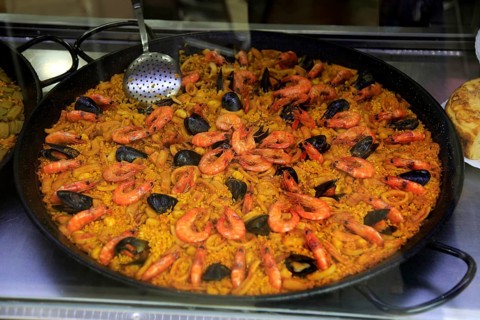 Large dish of freshly cooked seafood paella, city of Valencia, Spain, Europe