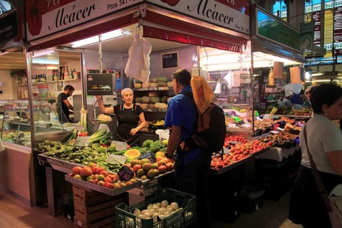 Food stall inside central market building, city of Valencia, Spain, Europe