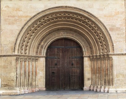 Arched doorway of the cathedral church building in city of Valencia, Spain, Europe