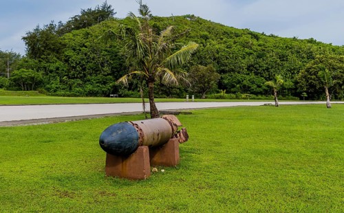 Side view of WWII torpedo in a public park in Guam