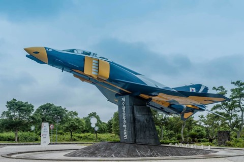 Phantom F-4 fighter jet mounted on stand on permanent display at museum in Jeju, South Korea, Asia