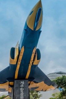 Phantom F-4 fighter jet mounted on stand on permanent display at museum in Jeju, South Korea, Asia