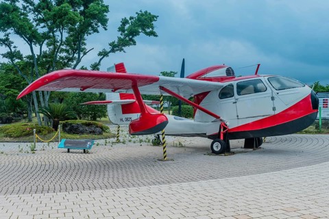 Republic RC-3 Seabee aircraft on display at museum under cloudy sky in Jeju, South Korea, Asia