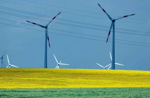 Wind farm with windmills and power lines, Nauen, 20/05/2022