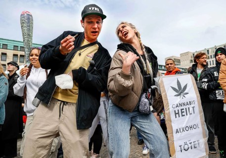 Demonstrators dance in favour of legal marijuana use. The demonstrators call for the legalisation