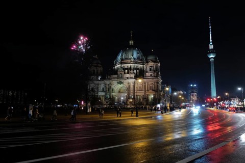 Fireworks in the night as New Year approaches over the Berlin Dome. Berlin, Germany, Europe
