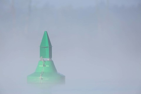 Foggy mood in the morning on the river Peene, fairway buoy in the fog, Flusslandschaft Peenetal