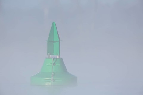 Foggy mood in the morning on the river Peene, fairway buoy in the fog, Flusslandschaft Peenetal