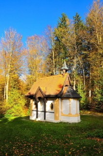 Hubertus Chapel in autumn-coloured forest near Oberschönenfeld in the Augsburg Western Forests
