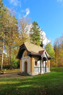 Hubertus Chapel in autumn-coloured forest near Oberschönenfeld in the Augsburg Western Forests