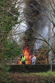 Farmers with tractors, craftsmen with vans and lorry drivers block the closed bridge Pont de