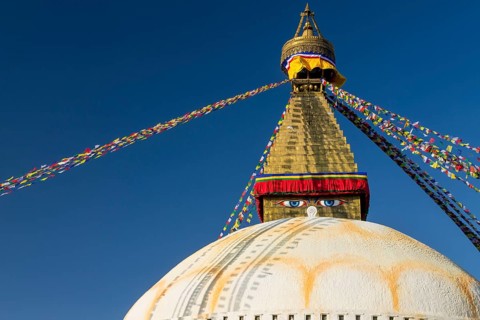 Dome and golden tower of Boudhanath, the Bouddha Stupa, the largest stupa in Nepal, Buddhist
