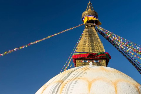 Dome and golden tower of Boudhanath, the Bouddha Stupa, the largest stupa in Nepal, Buddhist