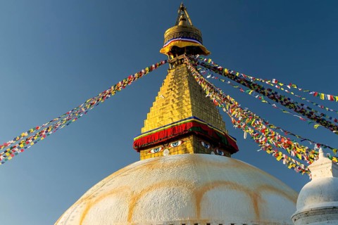 Dome and golden tower of Boudhanath, the Bouddha Stupa, the largest stupa in Nepal, Buddhist