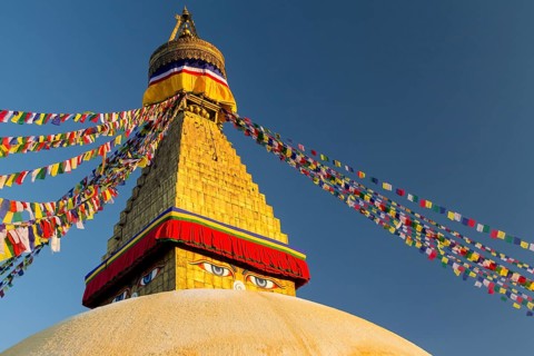 Dome and golden tower of Boudhanath, the Bouddha Stupa, the largest stupa in Nepal, Buddhist