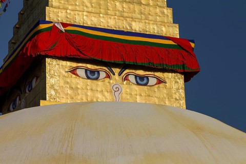 All-seeing eyes of Buddha, the Wisdom Eyes or Buddha's eyes, painted on the golden spire of