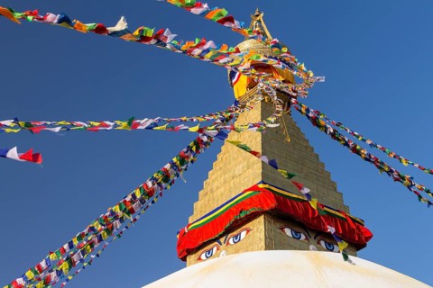 Dome and golden tower of Boudhanath, the Bouddha Stupa, the largest stupa in Nepal, Buddhist
