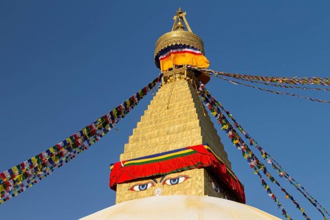 Dome and golden tower of Boudhanath, the Bouddha Stupa, the largest stupa in Nepal, Buddhist