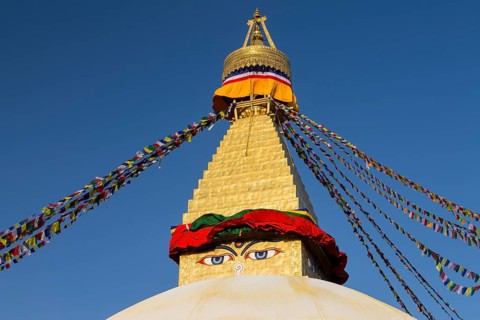 Dome and golden tower of Boudhanath, the Bouddha Stupa, the largest stupa in Nepal, Buddhist