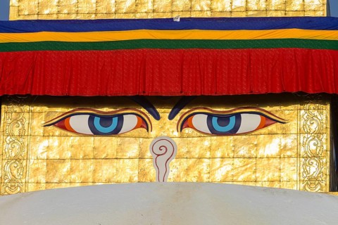 All-seeing eyes of Buddha, the Wisdom Eyes or Buddha's eyes, painted on the golden spire of