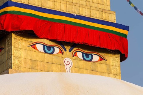 All-seeing eyes of Buddha, the Wisdom Eyes or Buddha's eyes, painted on the golden spire of