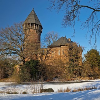 Linn Castle moated castle in Krefeld-Linn in winter, Krefeld, Lower Rhine, North Rhine-Westphalia,