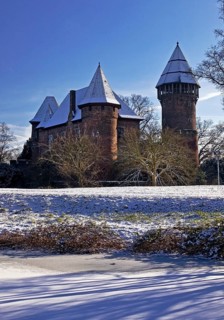Linn Castle moated castle in Krefeld-Linn in winter, Krefeld, Lower Rhine, North Rhine-Westphalia,